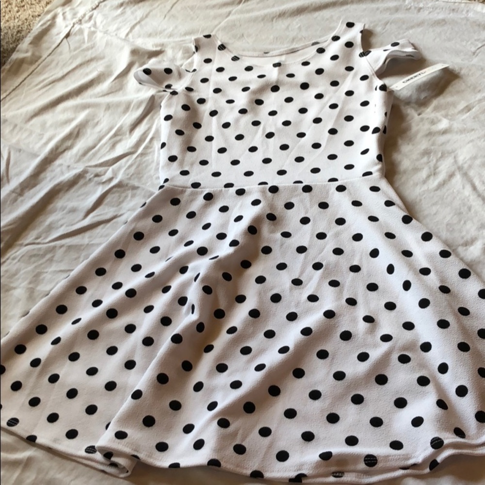 Polka dot peep shoulder swing dress